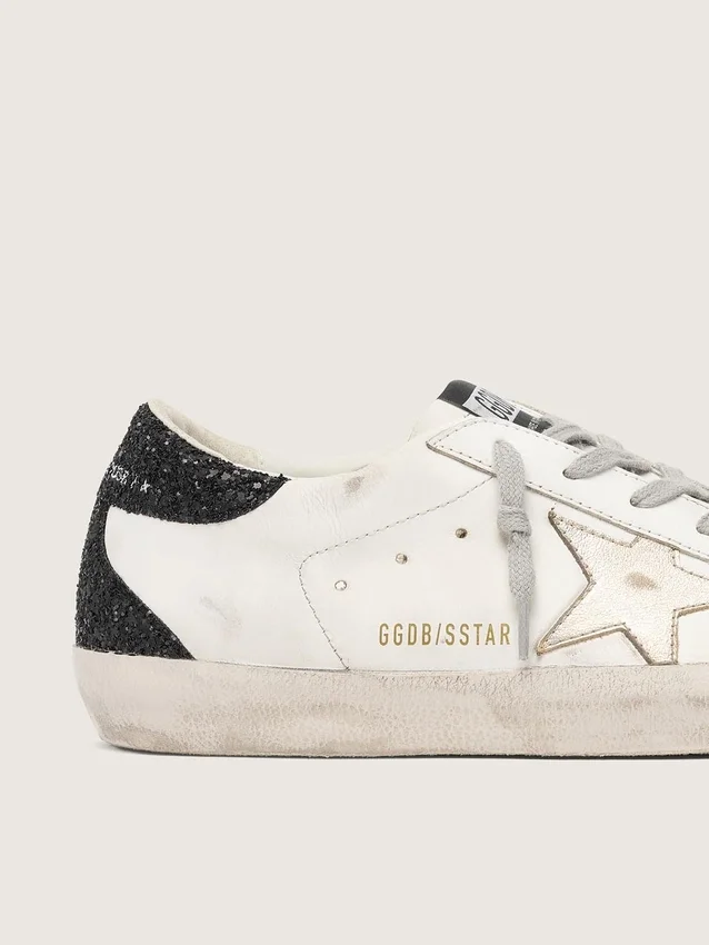 Super-Star für Damen mit goldenem Stern und schwarzer Glitzer-Fersenlasche