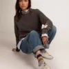 Super-Star für Damen mit goldglitzerndem Foxing und Metallnieten-Schriftzug