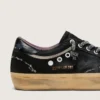 Super-Star LAB für Damen aus schwarzem, laminiertem Wildleder und Nylon mit erhabenem Stern und Schnürsenkeln mit Kristallen