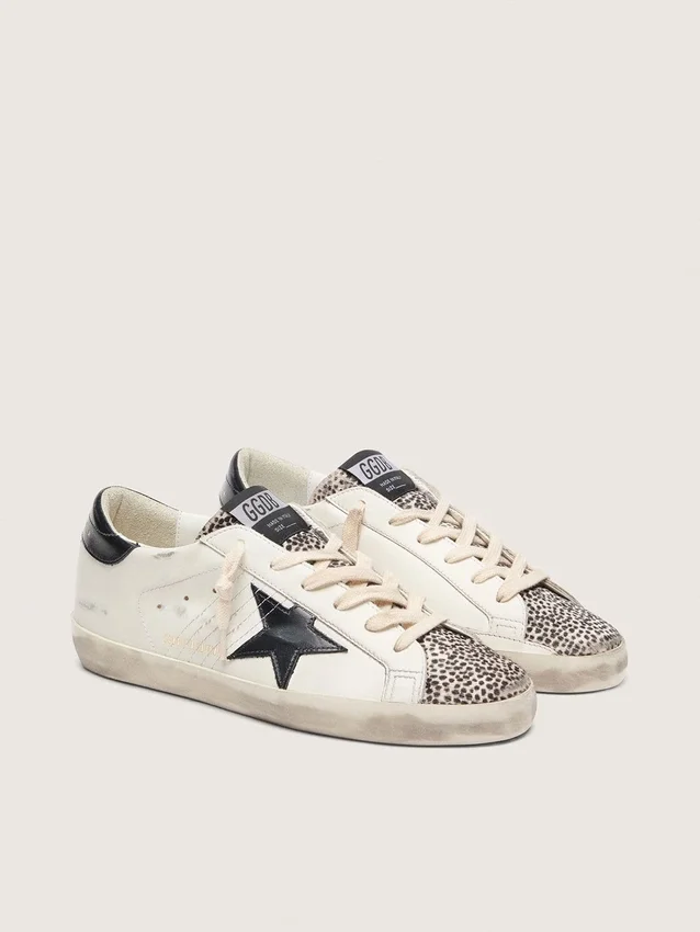 Super-Star LTD für Damen aus weissem Leder mit schwarzem Stern und Details aus Ponyfell