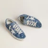 Super-Star LTD für Damen in hellblauem Denim mit weissem Lederstern und gestickten Blumen