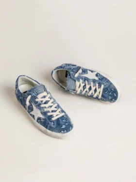 Super-Star LTD für Damen in hellblauem Denim mit weissem Lederstern und gestickten Blumen