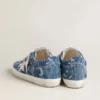 Super-Star LTD für Damen in hellblauem Denim mit weissem Lederstern und gestickten Blumen