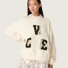 Unisex-Baumwoll-Sweatshirt «Star» in Vintage-Weiss mit gestickten VCE-Aufnähern