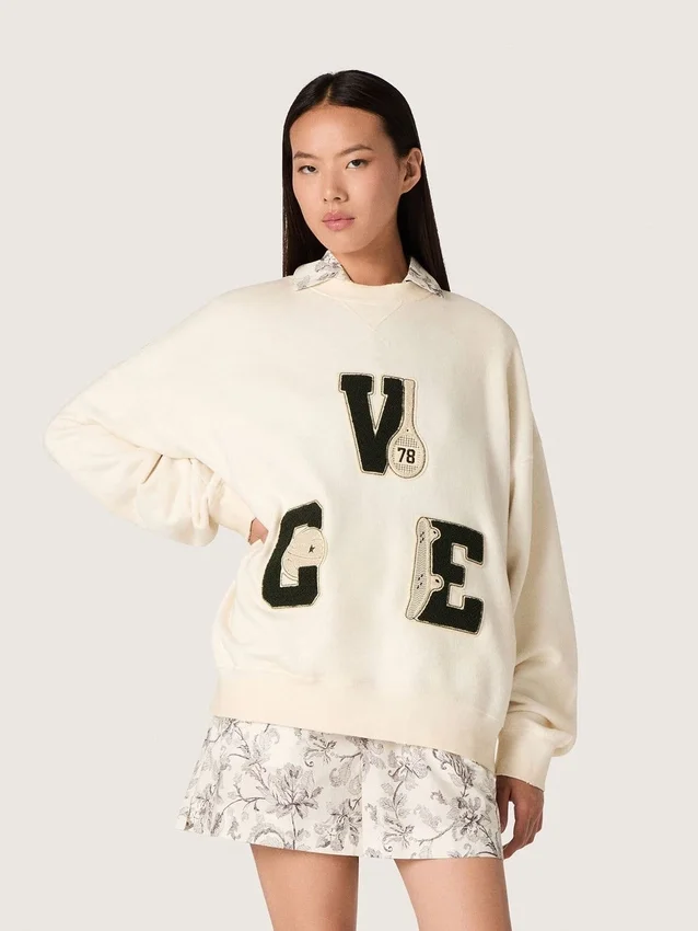 Unisex-Baumwoll-Sweatshirt «Star» in Vintage-Weiss mit gestickten VCE-Aufnähern