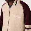 Unisex-Bomberjacke aus weissem und burgunderrotem Jacquard-Strick