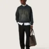 Unisex-Kapuzen-Sweatshirt aus schwarzer Baumwolle mit Bleich-Effekt