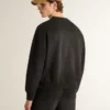 Unisex-Sweatshirt aus abgenutzter schwarzer Baumwolle mit gesticktem Logo