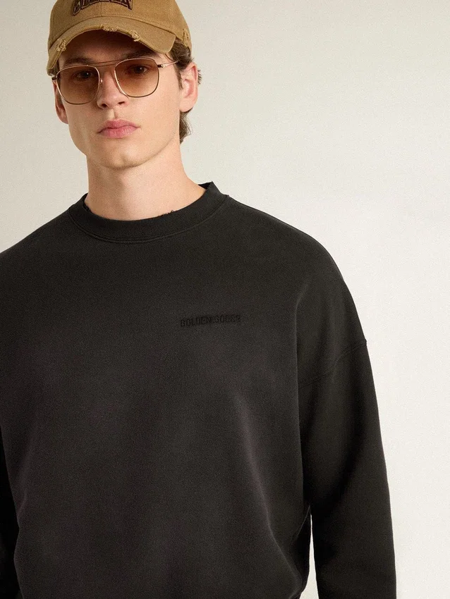 Unisex-Sweatshirt aus abgenutzter schwarzer Baumwolle mit gesticktem Logo