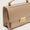 Venezia-Tasche aus beigem, genarbtem Leder mit goldenen Details