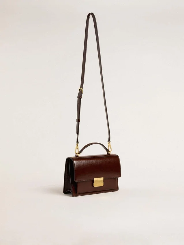 Venezia-Tasche aus dunkelbraunem laminiertem Leder mit goldenen Details