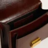Venezia-Tasche aus dunkelbraunem laminiertem Leder mit goldenen Details