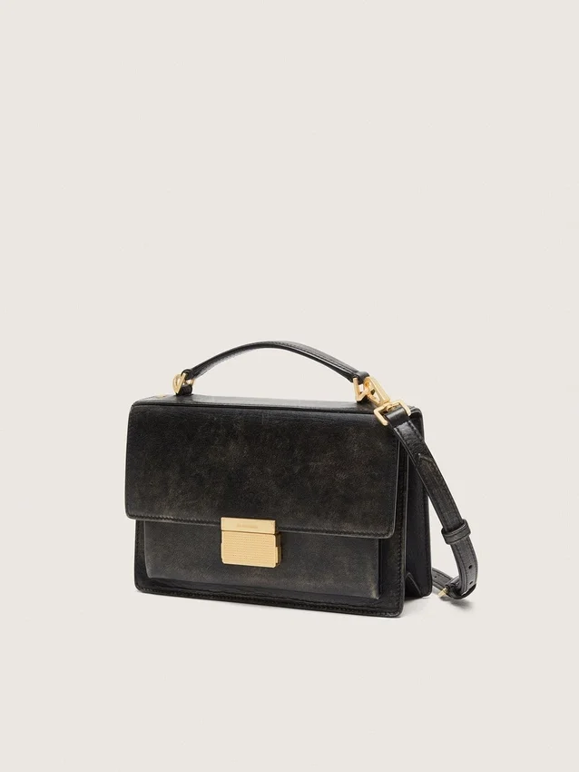 Venezia-Tasche aus schwarzem, auf Alt getrimmtem Leder mit goldenen Details