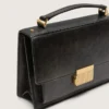 Venezia-Tasche aus schwarzem, auf Alt getrimmtem Leder mit goldenen Details