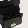 Venezia-Tasche aus schwarzem, geprägtem Leder mit goldenen Details