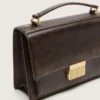 Venezia-Tasche aus vintage-dunkelbraunem, geprägtem Leder mit goldenen Details