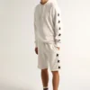 Vintage-weisse Bermuda-Shorts für Herren mit kontrastierenden schwarzen Sternen