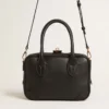 Vita-Tasche aus glattem schwarzem Leder mit goldenen Details