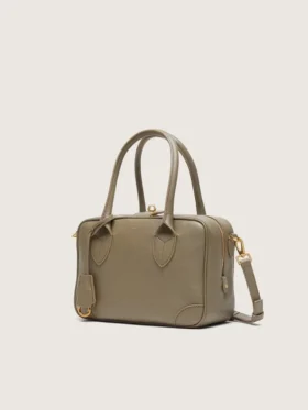 Vita-Tasche aus salbeigrünem Leder mit goldenen Details