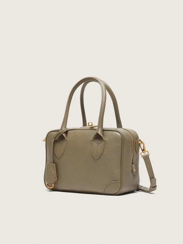 Vita-Tasche aus salbeigrünem Leder mit goldenen Details