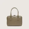 Vita-Tasche aus salbeigrünem Leder mit goldenen Details