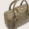 Vita-Tasche aus salbeigrünem Leder mit goldenen Details