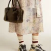 Vita-Tasche aus schwarzem Leder im Distressed-Look mit goldenen Details