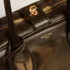 Vita-Tasche aus schwarzem Leder im Distressed-Look mit goldenen Details
