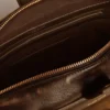 Vita-Tasche aus schwarzem Leder im Distressed-Look mit goldenen Details