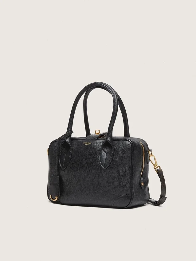 Vita-Tasche aus schwarzem Schafsleder mit goldenen Details