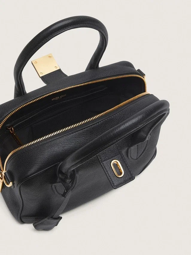 Vita-Tasche aus schwarzem Schafsleder mit goldenen Details