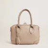 Vita-Tasche aus taupefarbenem Leder mit goldenen Details