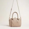 Vita-Tasche aus taupefarbenem Leder mit goldenen Details