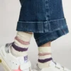 Weisse Kindersocken mit rosa und lila Streifen