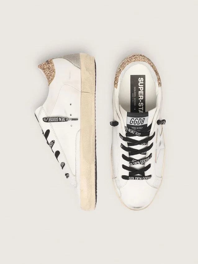 Weisse Super-Star-Damensneaker aus Leder mit glitzernder Fersenlasche