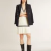 Weisses Baumwoll-Westenkleid für Damen im Used-Look mit dunkelblauen Rippbündchen und Kristallen