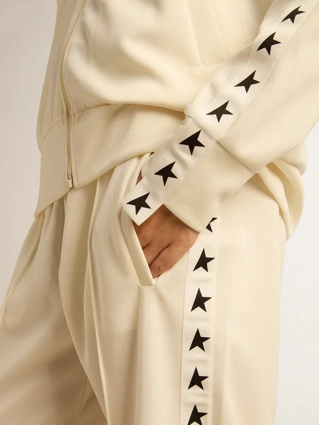 Weisses Damen-Sweatshirt mit Reissverschluss, weissem Streifen und schwarzen Sternen