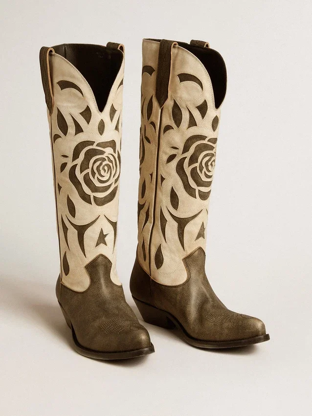 Wish Star-Stiefel aus schwarz-weissem Leder mit eingearbeiteter Rose und Stern