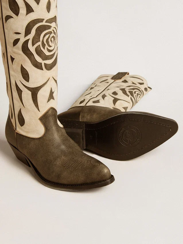 Wish Star-Stiefel aus schwarz-weissem Leder mit eingearbeiteter Rose und Stern