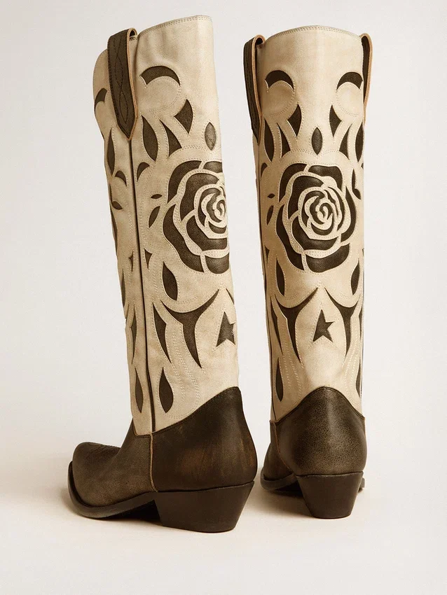 Wish Star-Stiefel aus schwarz-weissem Leder mit eingearbeiteter Rose und Stern